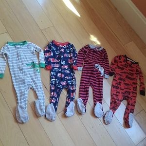 Lot of Carter's boy footed pajamas
